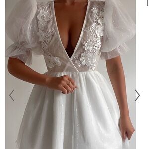 Showpo “Akshia Mini Dress” with Puff sleeves